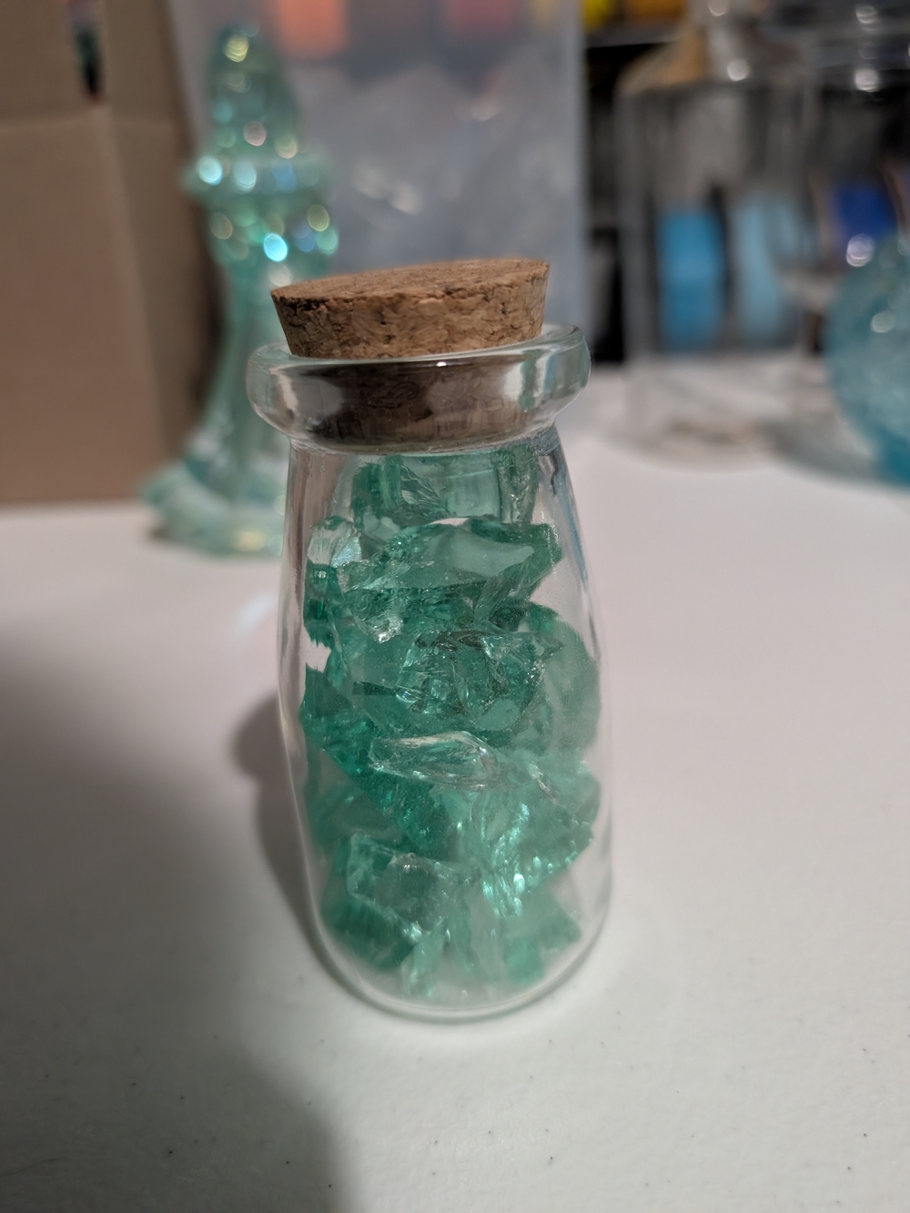 Decorative Glass Bottle with Aqua Glass Chips - Home Accents